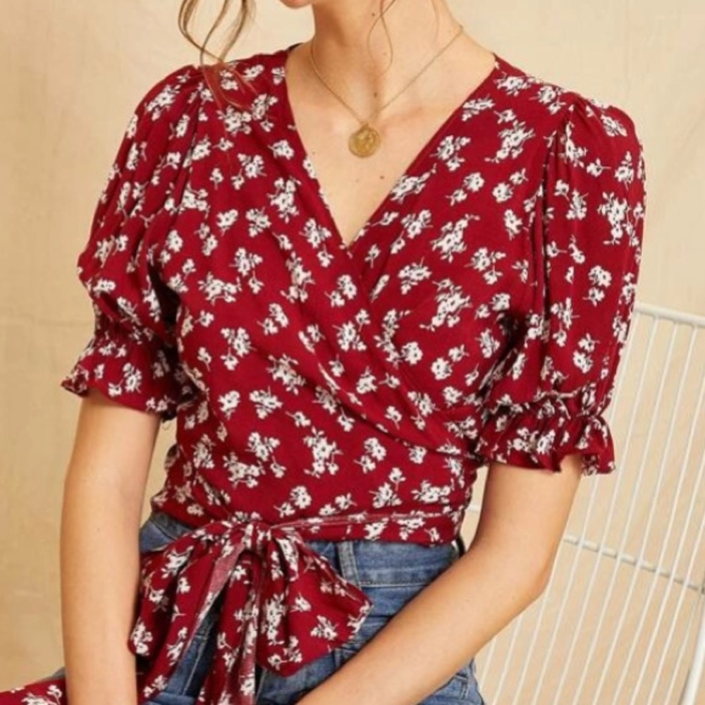 Never worn floral wrap top with flowy slee…